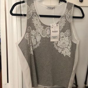 Zara Gray tank with white floral decor